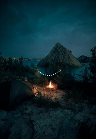 Bonfire Near Tent And Mountain During Night Time Photo