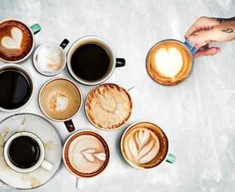 Premium Photo Of Assorted Coffee Cups On A Textured