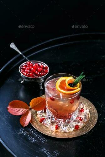 Red Alcoholic Coctail With Vodka And Juice On A Black Background