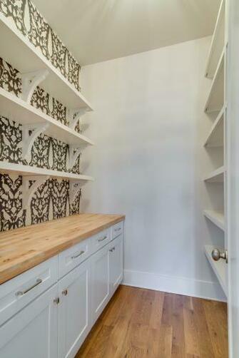 Inspiring Building Ideas Organized Pantry With Floral Wallpaper