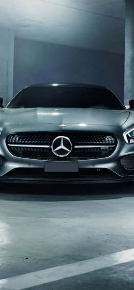 Silver iPhone Xs Mercedes Amg Background In Parking Lot Wallpaper