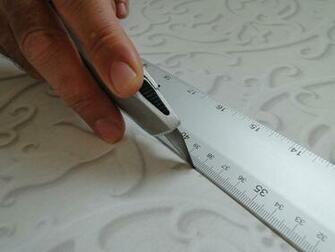 Outside Of The Glass Smoothing Out To Corners Using A Wallpaper