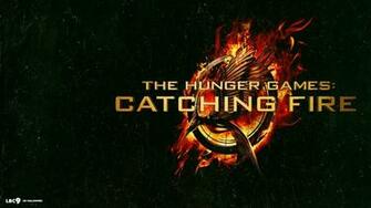 Hunger Games Catching Fire Logo In Green Background Wallpaper And