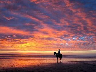 Cowboys Pferde Reiter Ufer Sonnenuntergang Wallpaper