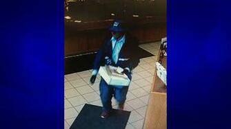 First National Bank Robbery Blue Background Kdlt