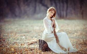 White Dress Girl Sitting On Stump Long Blonde Hair