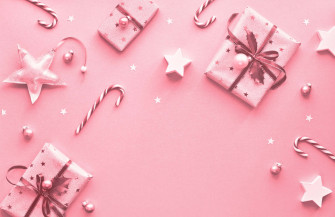 Celebrate The Holiday Season With A Bright And Cheerful Pink Wallpaper