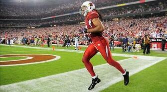 University Of Phoenix Logo Pictures Scoring A First Half ToucHDown