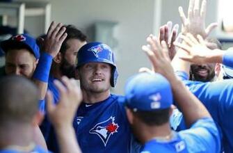 Toronto Blue Jays Third Baseman Josh Donaldson Is Congratulated