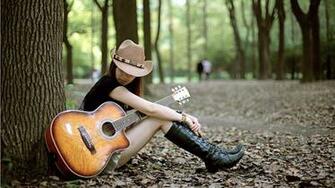 Girl With Guitar X Close