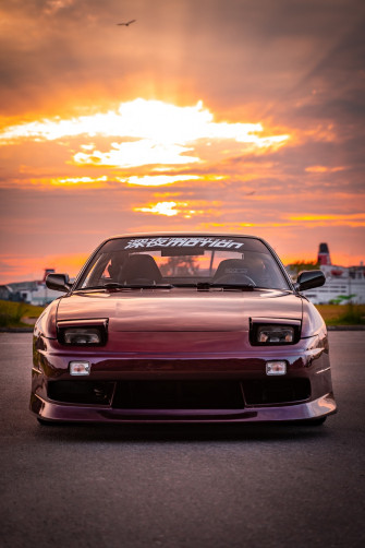 Red Chevrolet Camaro On Road During Sunset Photo Uddevalla