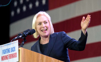 Senator Kirsten Gillibrand Extending Her Left Hand In A Wallpaper