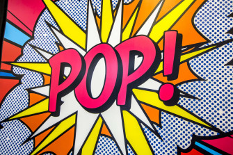 A Vibrant Pop Art Background Complete With Clashing Colors And Bold Designs Wallpaper