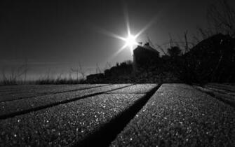 Sun Shining Behind A House Wallpaper