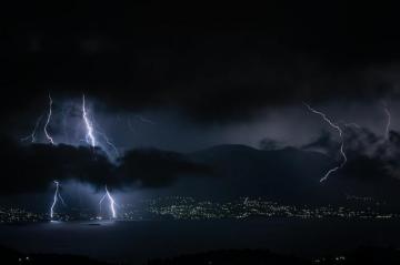 Lightning Strike On Mountain During Night Time Photo Image