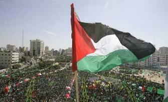 Palestine Flag Waving In Palestinian City Jpg