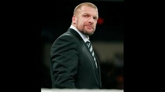 Triple H Welcomes Brock Lesnar Back To Wwe Photos