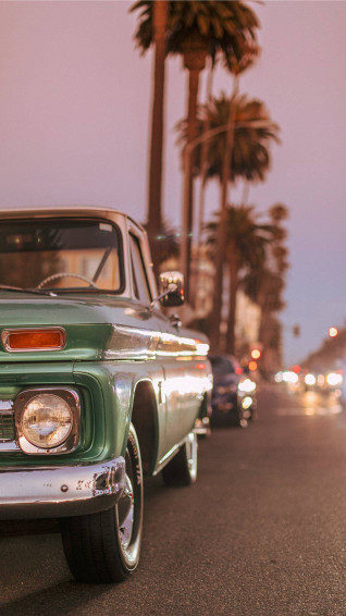 Metallic Green Car Retro Aesthetic iPhone Wallpaper