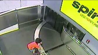 On Camera A Toddler Is Swept Away Airport Conveyor Belt