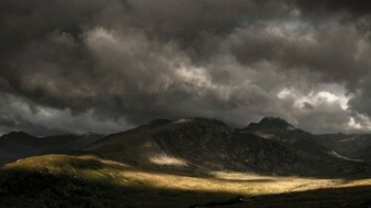 Dark Clouds Over The Mountains Wallpaper And Image