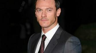 Luke Evans Suit HD Wallpaper Wallpaperfx