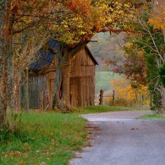 Country Lane And Barn Look At The