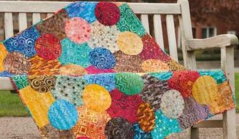 Quilt Becomes A Stunner With Large Scale Prints And Fusible Appliqu