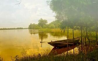Boat On A Foggy Lake Wallpaper Nature