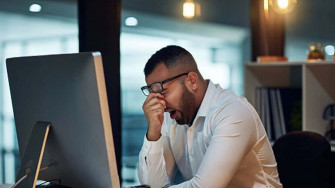 Lackadaisical Worker Lounging At The Office Desk N55jmrfj5kba3f04 Wallpaper