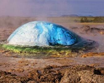 Strokkur Geyser Water Explosion Geothermal Area Along The River