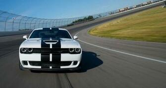 Dodge Challenger White Black Color On Racing Track Full Speed