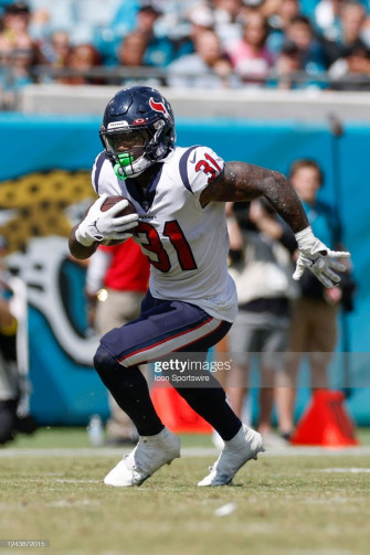 Houston Texans Running Back Dameon Pierce Runs With The Ball During Wallpaper