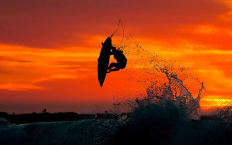 Sunset Surf Jump Background Wallpaper