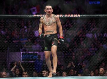 Max Holloway Retains Title At Ufc