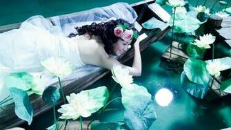 Woman In The Boat Daydreaming Wallpaper