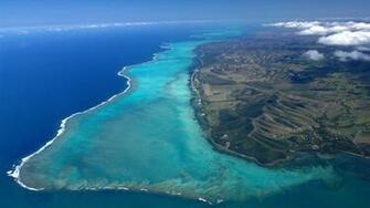 M Compressional Earthquake Near New Caledonia Triggers Swarm
