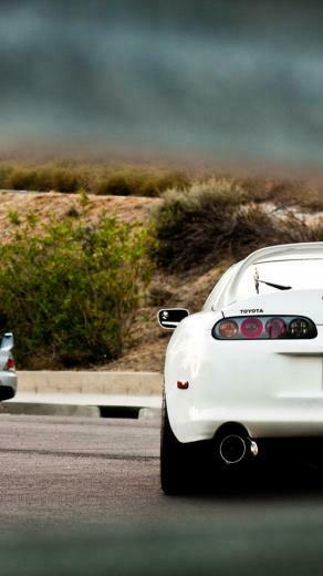 There S A Evo In The Background Toyota Supra