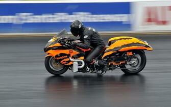 Man In Orange And Black Stripesports Bike HD Wallpaper