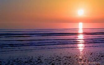 Desktop Background Of A Sunset Over Gentle Ocean At Walney Island