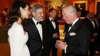George And Amal Clooney Attend Charity Dinner At Buckingham Palace