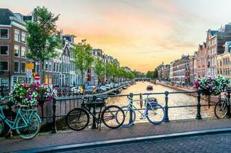 Photography Of Bicycles Parked On Bridge Amsterdam HD Wallpaper
