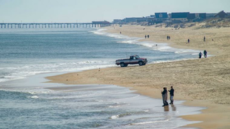 Fishing On Nags Head Beach In Outer Banks North Carolina With