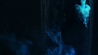 Abstract Dark Blue Background Ink In Water Close Up