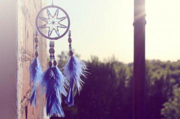 Selective Focus Of Hanging Blue And Black Dream Catcher Photo